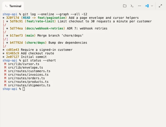 The stage with a terminal tab: git log shows the thread's branch next to the others, and git status lists the seven files the agent changed.